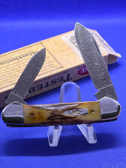 2009 Case XX Stag Handle Canoe with Raindrop Damascus 52131 DAM 06098