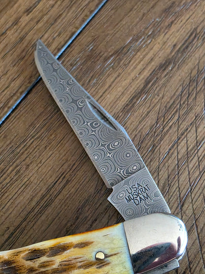 2007 Case XX Rain Drop Damascus Muskrat with Amber Bone Handles No Box