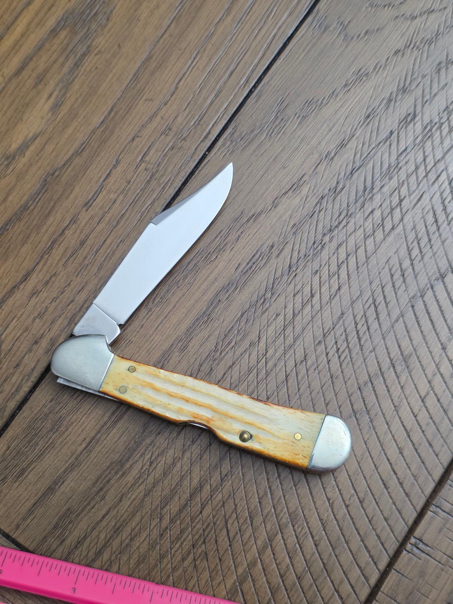 1997 Case XX Burnt Natural Jigged Bone Copperlock with Floating Dots