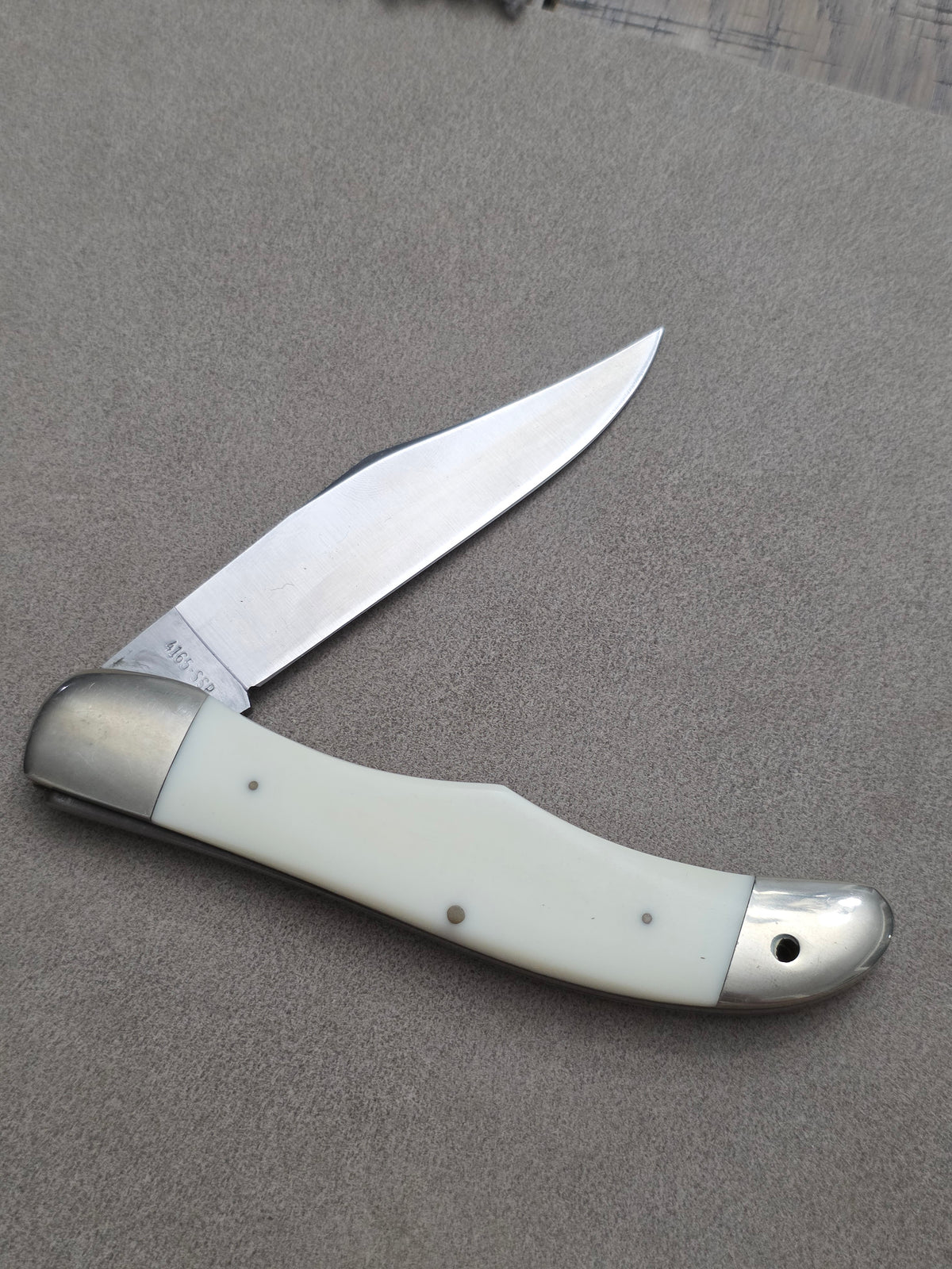 1977 Case XX Stainless Texas Special White Synthetic Folding Hunter