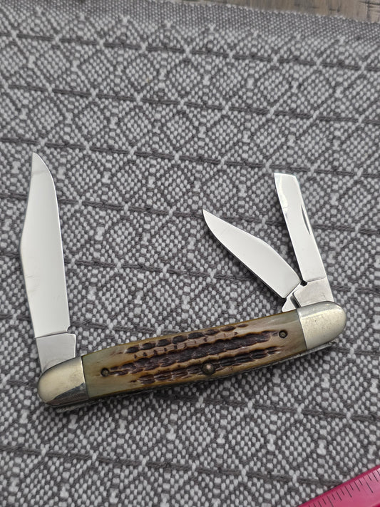 1993 Case XX SC06347 Amber Bone Whittler Style with Roman Numerals