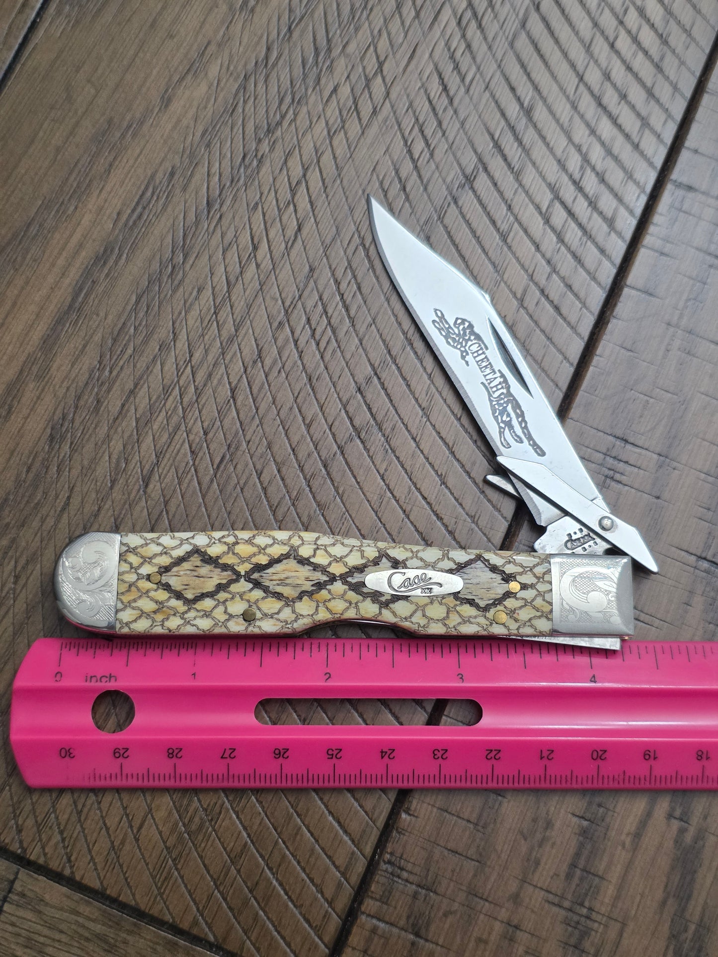 2003 Case XX Smooth Antique Rattlesnake Cheetah Scrolled Bolster