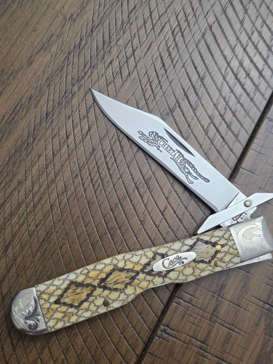 2003 Case XX Smooth Antique Rattlesnake Cheetah Scrolled Bolster