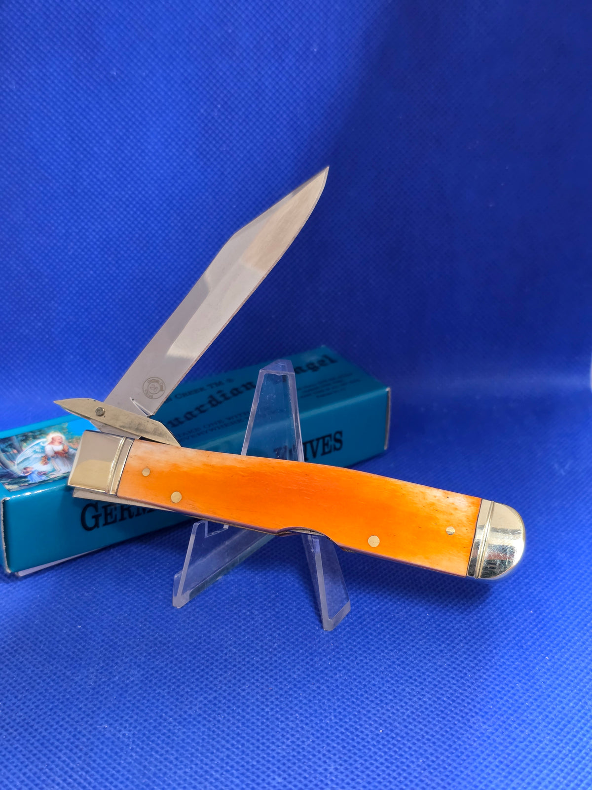 Guardian Angel Lock Back Cheetah Knife Orange Bone Handles 4 3/8" EM2567052ORBN