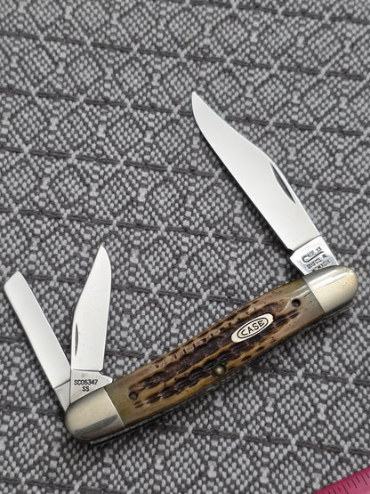 1993 Case XX SC06347 Amber Bone Whittler Style with Roman Numerals