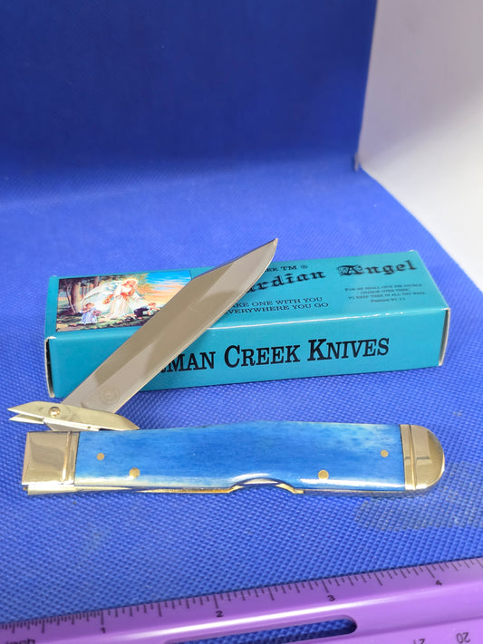 Guardian Angel Lock Back Cheetah Knife Blue Bone Handles 4 3/8" EM2567052BLBN