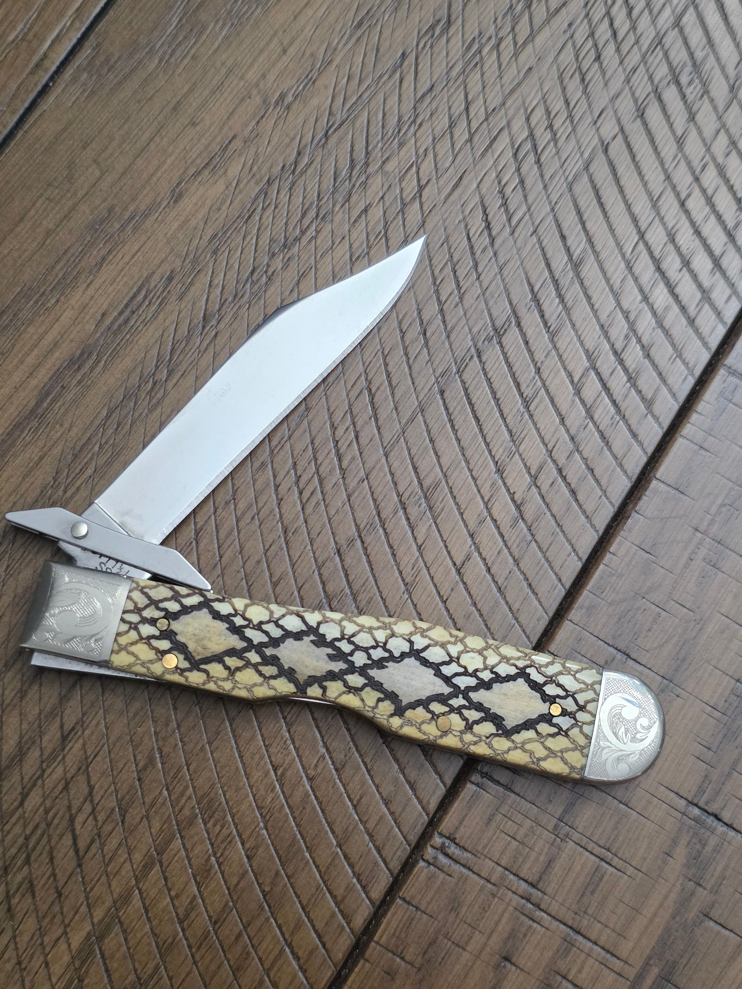 2003 Case XX Smooth Antique Rattlesnake Cheetah Scrolled Bolster