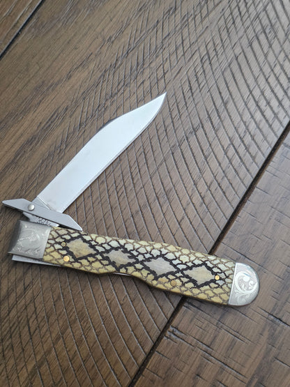 2003 Case XX Smooth Antique Rattlesnake Cheetah Scrolled Bolster