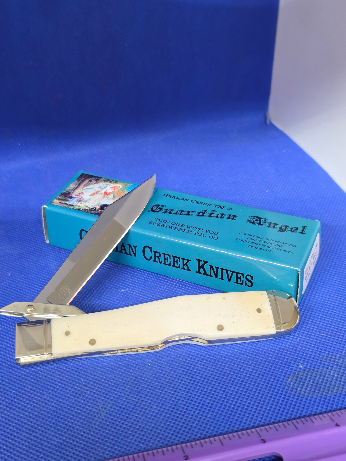 Guardian Angel Lock Back Cheetah Knife White Bone Handles 4 3/8" EM2567052WBN