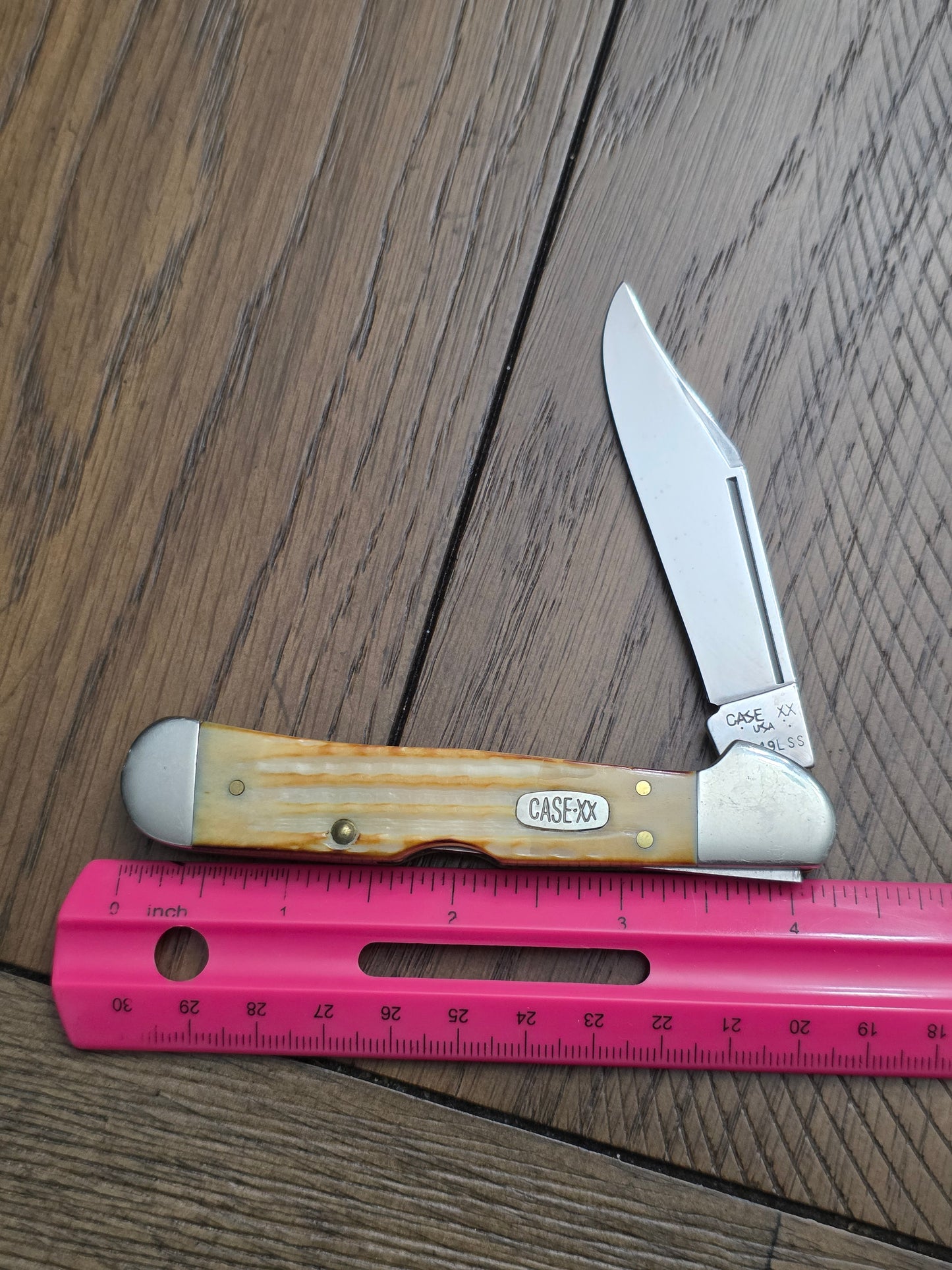 1997 Case XX Burnt Natural Jigged Bone Copperlock with Floating Dots