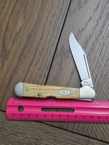 1997 Case XX Burnt Natural Jigged Bone Copperlock with Floating Dots