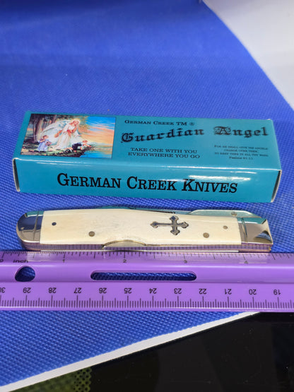 Guardian Angel Lock Back Cheetah Knife White Bone Handles 4 3/8" EM2567052WBN