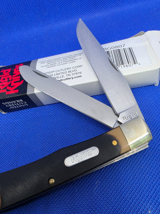 Rigid Trapper Sawcut Delrin Handles NIB RG0807 by United Cutlery